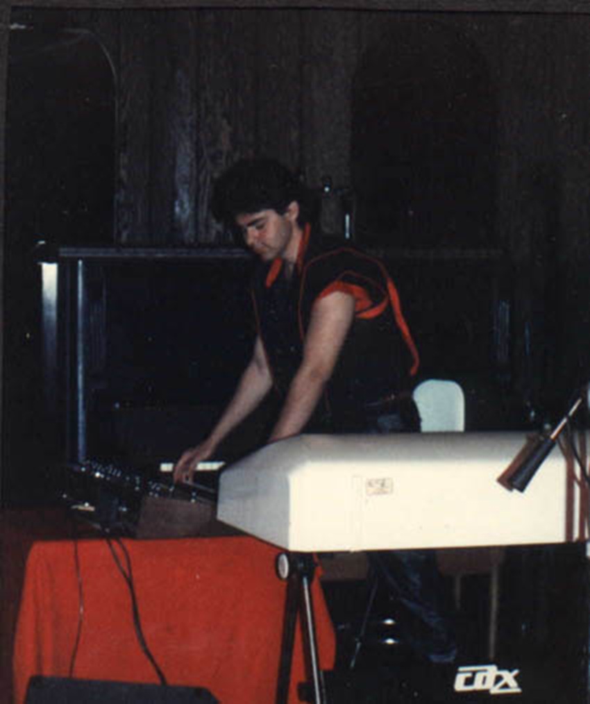 Robert playing piano and keyboards